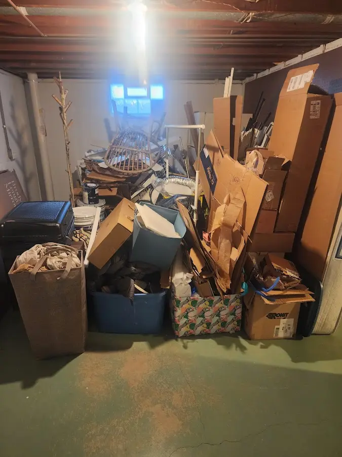 Roll-off dumpster container at job site for 2 Yard Dumpster Rental in Wayne